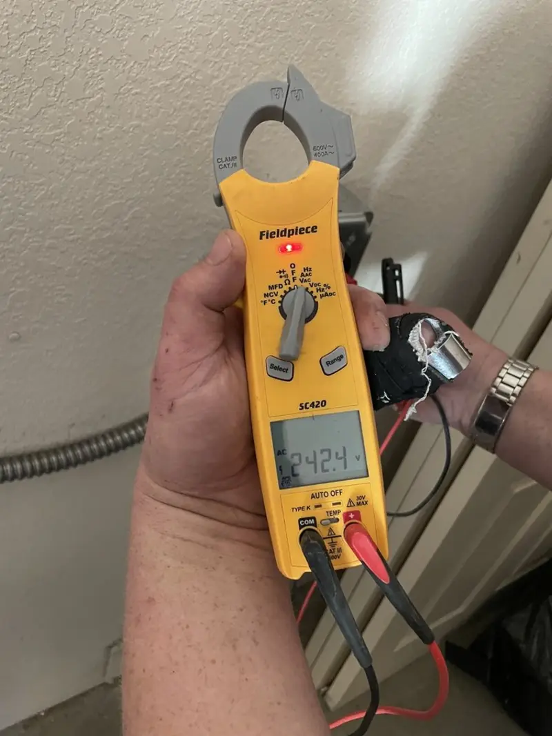 Voltage testing with clamp meter during Generator Installation in Golden Hills